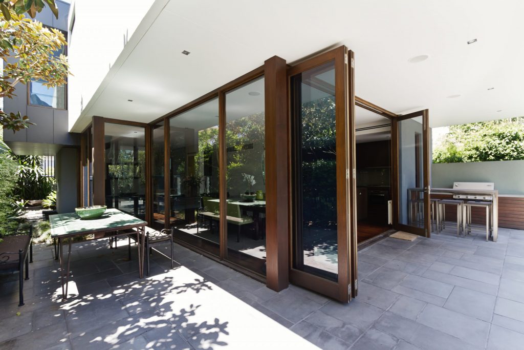 Bi fold doors opening to rear courtyard of contemporary Australian home