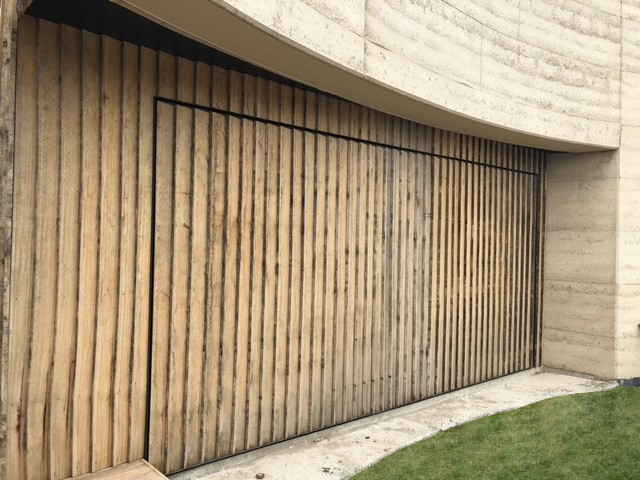 a closed up of a beautiful facade garage door